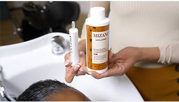 relaxer-mizani-bond-phorce-applied-to-hair